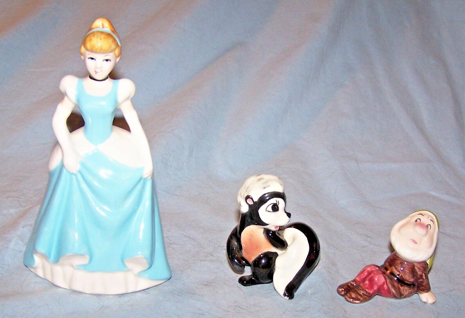 3 Ceramic Figurines-Disney Cinderella, Sneezy &amp; Skunk - $25.00