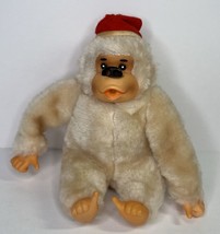 Vintage LIDO Rubber Faced Gorilla Thumb Sucking with Santa Hat - $9.64