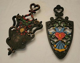 2 CAST IRON TRIVETS - $15.00