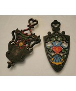 2 CAST IRON TRIVETS - $15.00
