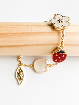 Carnelian, Onyx, and Mother of Pearl Ladybug and Flowers Bracelet in Gold - $75.00