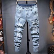 Light Blue Slim Fit Jeans - £31.52 GBP