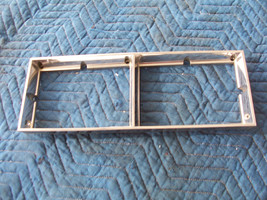 1985 OLDS TORONADO LEFT HEADLIGHT TRIM BEZEL GRILL OEM USED WEAR OLDSMOBILE - £115.52 GBP