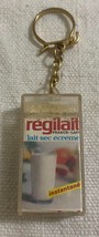 Vintage advertising keychain Régilait milk drink old collection pack 60s... - $184.87 MXN