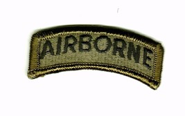 AIRBORNE TAB SUBDUED  - BLACK ON OLIVE SEEM TO BE NEW - $3.00