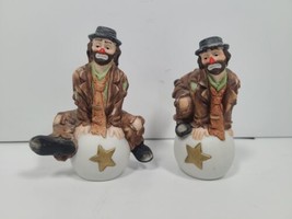 Lot Of 2 Vintage Flambro Emmett Kelly Hobo Clown Figurines Sitting on Star Balls - $19.79
