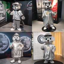 Silver Guinness mascot costume character dressed with a Windbreaker and ... - $1,239.00