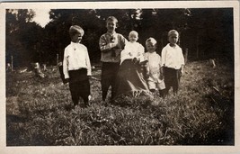 RPPC Young Boys With Baby Sibling Photo in Garden c1910 Postcard U6 - £3.94 GBP