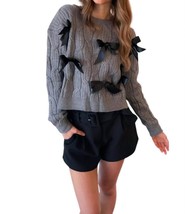 Storia All Over Bow Sweater Size L - $24.75