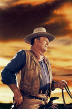 John Wayne in Chisum iconic in silhoutte against sunset on horse 18x24 P... - $23.99