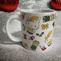 New Hello Kitty Christmas Holiday Coffee Mug Happy Holidays Bear Bow NEW - $24.02