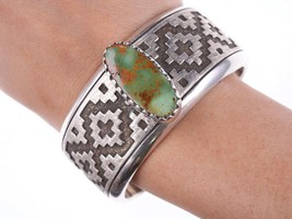 Dan Jackson (1944-2022) Navajo rug tufa cast bracelet with Ajax turquoise - $985.05