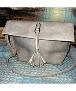 New without tags faux leather/suede purse with tassel detail - $14.70