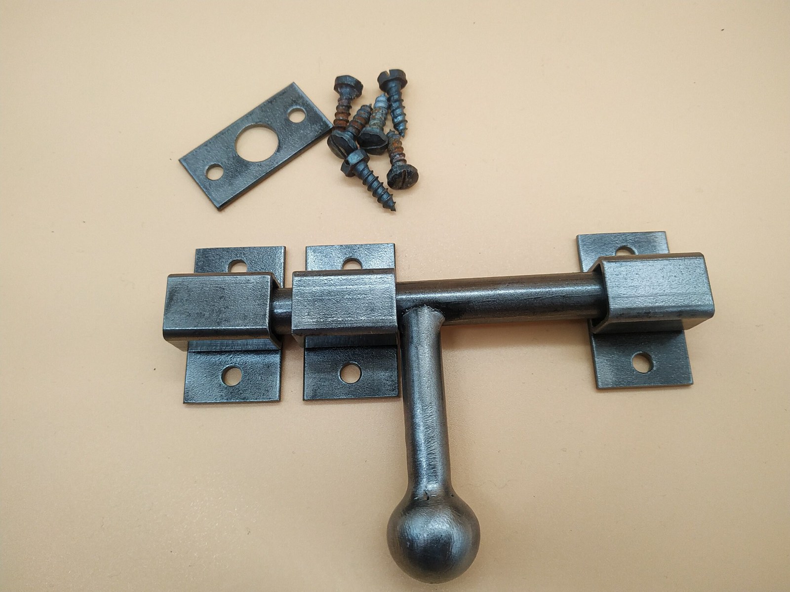 An industrial door latch, made from steel in a rural style, ensures reli... - $33.50