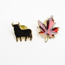 Black Angus Cattle Bull &amp; Ruby Red Maple Leaf Canada Pins Gold Tone Outline - $17.19