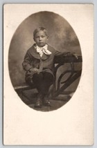 RPPC Cute Little Boy Pin Stripe Outfit Sad Face Eils Bros Pittsburg Postcard E26 - £7.81 GBP