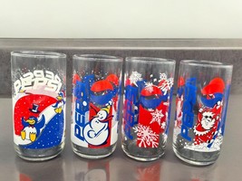 Vintage set of 4 Pepsi Christmas Glasses Different designs Santa, Pengui... - $24.75