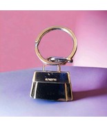 Rosetti silver vintage purse keychain - $443.26 MXN