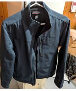  blue Kirkland Signature men's softshell jacket - $4.99