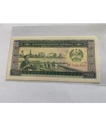 1979 Laos   100 kip  Banknote UNC - $3.93 CAD