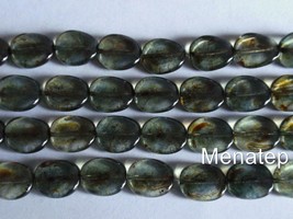 25 12 x 9 mm Czech Glass Twisted Flat Oval Beads: Luster - Transparent Green - £3.20 GBP