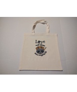 Canvas Tote Bag with Love is a wet nose and a wagging tail design on bot... - $224.15 MXN
