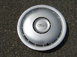 One genuine 1986 to 1989 Ford Taurus 14 inch hubcap wheel cover - $14.00