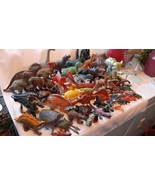 Dinosaurs over 10 pounds rubber/plastic 2 battery, 20 med/large 57 small... - $2,575.06 MXN