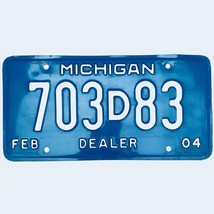 2004 United States Michigan Base Dealer License Plate 703D83 - £13.15 GBP
