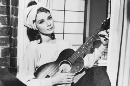 Audrey Hepburn In Window Playing Guitar 18x24 Poster - £19.17 GBP