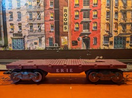 Marx Trains Used  #586A/04563  Plastic ERIE Stake Side Flat Car  Maroon  - $8.00