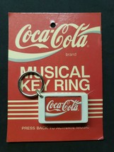 Vintage 1990 Coca Cola Music Key Ring New in Package New Old Stock U127 - £8.78 GBP