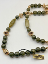 Vintage Lucite Necklace, Tag, Greens, Gold tone . 26”. Hong Kong. NWT - $331.52 MXN