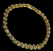 Avon tennis bracelet. gold tone with cz's 7” Long - $19.00