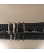 Silver stackable rings (4) costume jewelry - $393.89 MXN