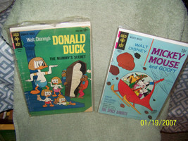 lot of {2} vintage  goldkey comic books {walt  disney} - $6.93