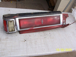 1977 OLDSMOBILE OLDS DELTA 88 ROYALE LEFT TAILLIGHT USED OEM CRACKD REVE... - £233.53 GBP