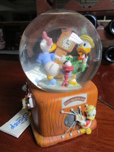 Disney Donald and Daisy dancing music box  snowglobe, it plays &quot;In the mood&quot;[aA] - £146.40 GBP