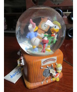 Disney Donald and Daisy dancing music box  snowglobe, it plays &quot;In the m... - $217.00 CAD
