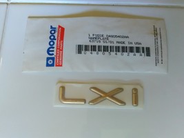 Chrysler Town &amp; Country LXi new old stock gold OEM emblem. - $19.00