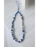 Blue Eye Phone Charm Strap - $186.13 MXN