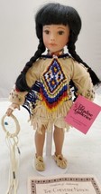 Paradise Galleries Purveyor of the World Finest Porcelain Dolls with Doll Stand - $6.93