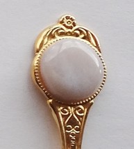 Collector Souvenir Spoon Opaque Milky White Rock Stone Emblem - £2.35 GBP