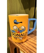 Walt Disney World Fiesty Donald Duck Yellow Blue White Ceramic Mug 14 oz... - £22.02 GBP