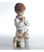 Lladro - Bless Us All  - Size 19 x 10cm - $181.67