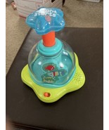 SPINNING TOP WITH MUSIC AND BUBBLING SOUNDS WORKS GOOD. - £8.13 GBP