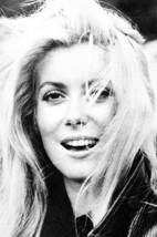 Catherine Deneuve beautiful smiling late 1960&#39;s hair blowing 18x24 Poster - $23.99