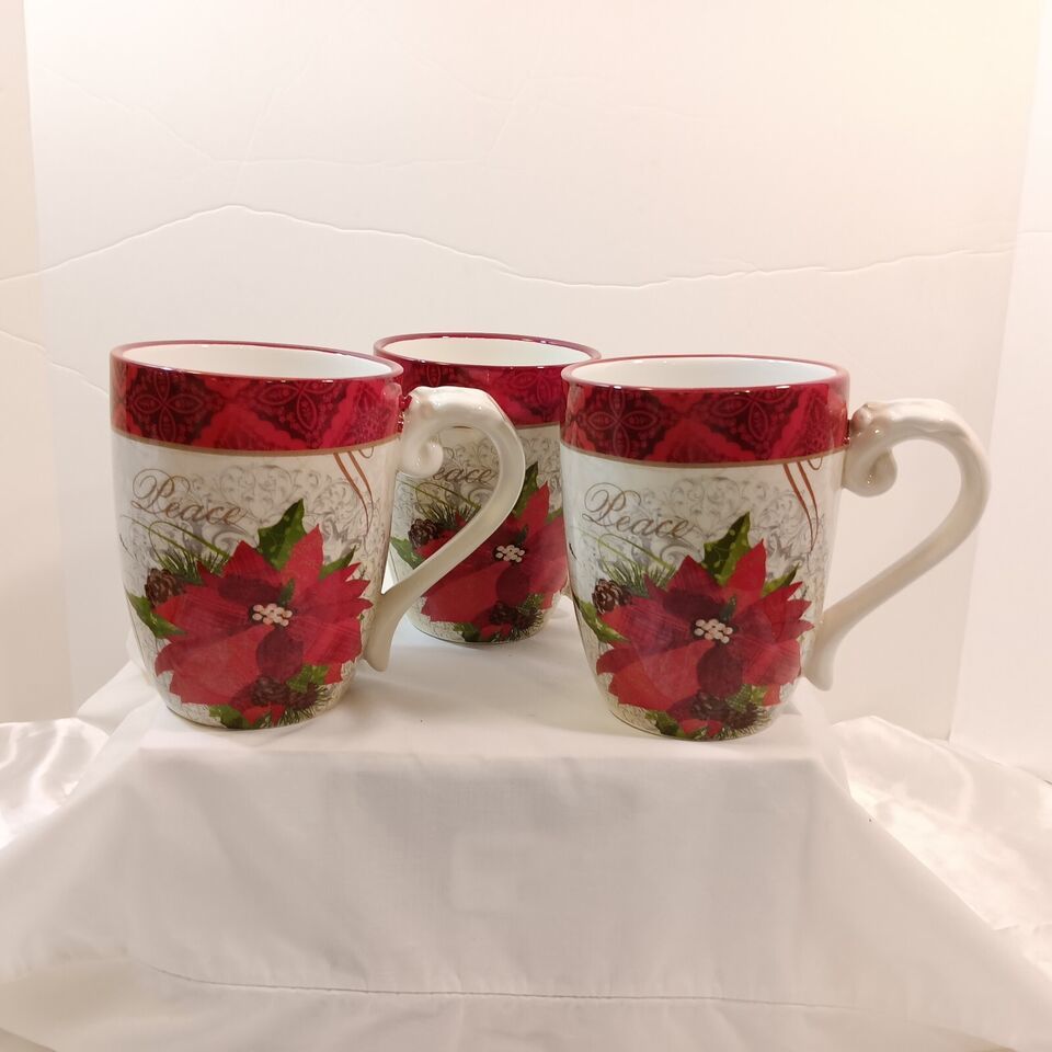 3- Cracker Barrel Season of Peace Poinsettia Holiday Coffee Mugs by: L. Siebert - $41.58