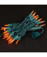 Candle Tip 35 Lights Traditional T5 Amber on Green Wire - $410.43 MXN