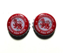 2 Singha Soda bottle caps! Rare collectibles for fans. grab yours today - $5.94